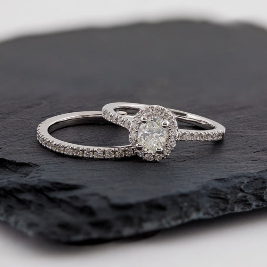 Natural 1 ct. tw. Oval Diamond Halo Wedding Set in 14K White Gold side profile