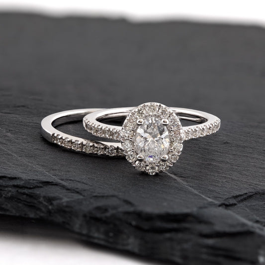 Natural 1-1/2 ct. tw. Oval Diamond Halo Wedding Set in 14K White Gold side profile
