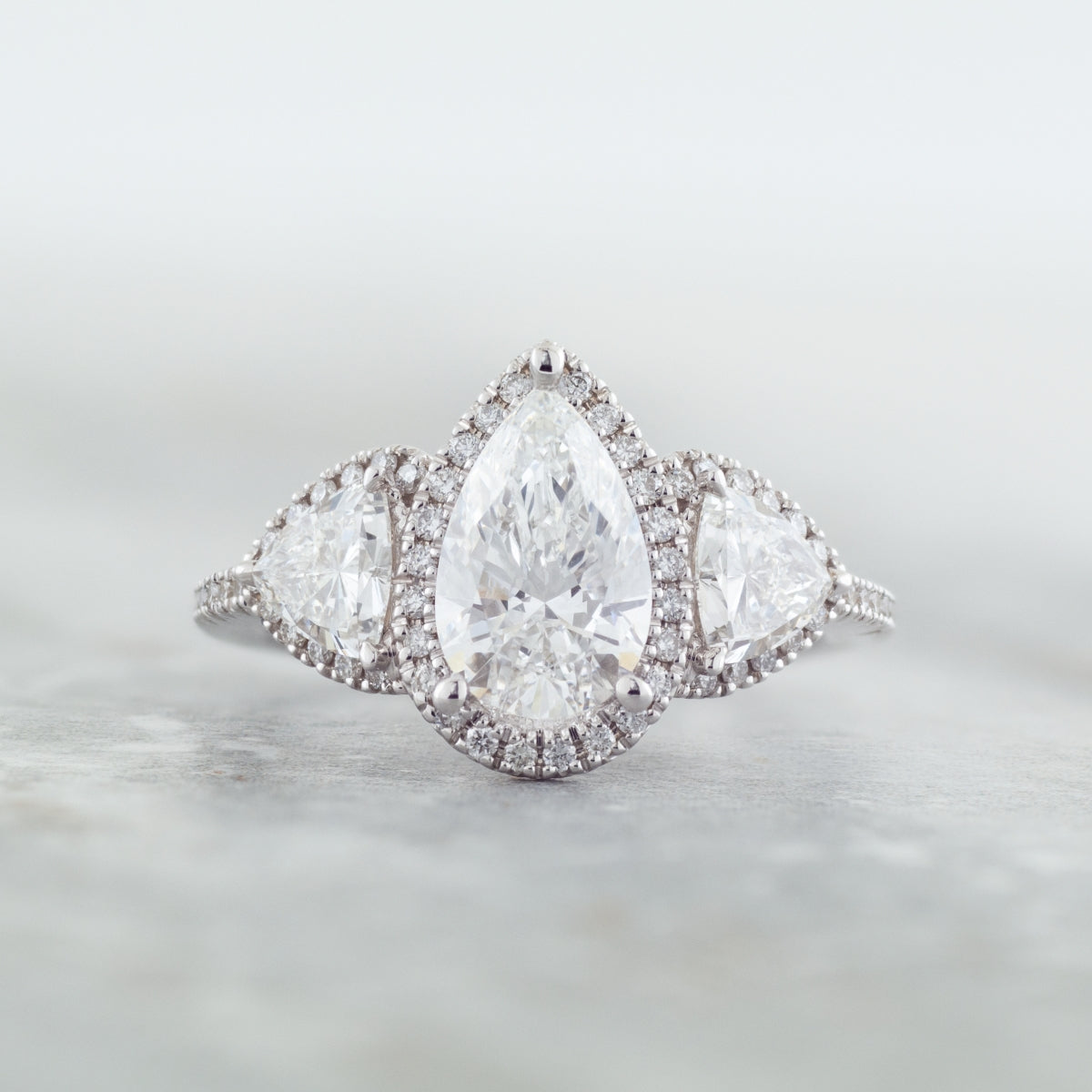 Adamante 2-1/2 ct. tw. Lab-Grown Pear & Trillion Diamond Halo Engagement Ring in 14K White Gold close-up detail