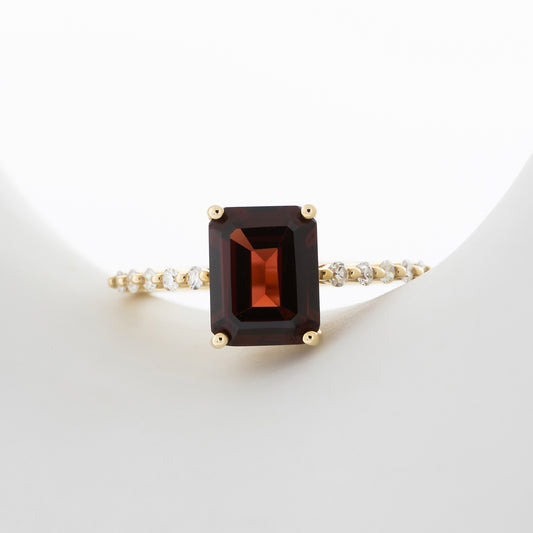 Emerald Cut Garnet & 1/6 ct. tw. Diamond Ring in 10K Yellow Gold full view
