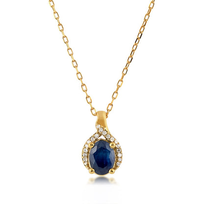 Oval Sapphire & Diamond Halo Pendant in 10K Yellow Gold