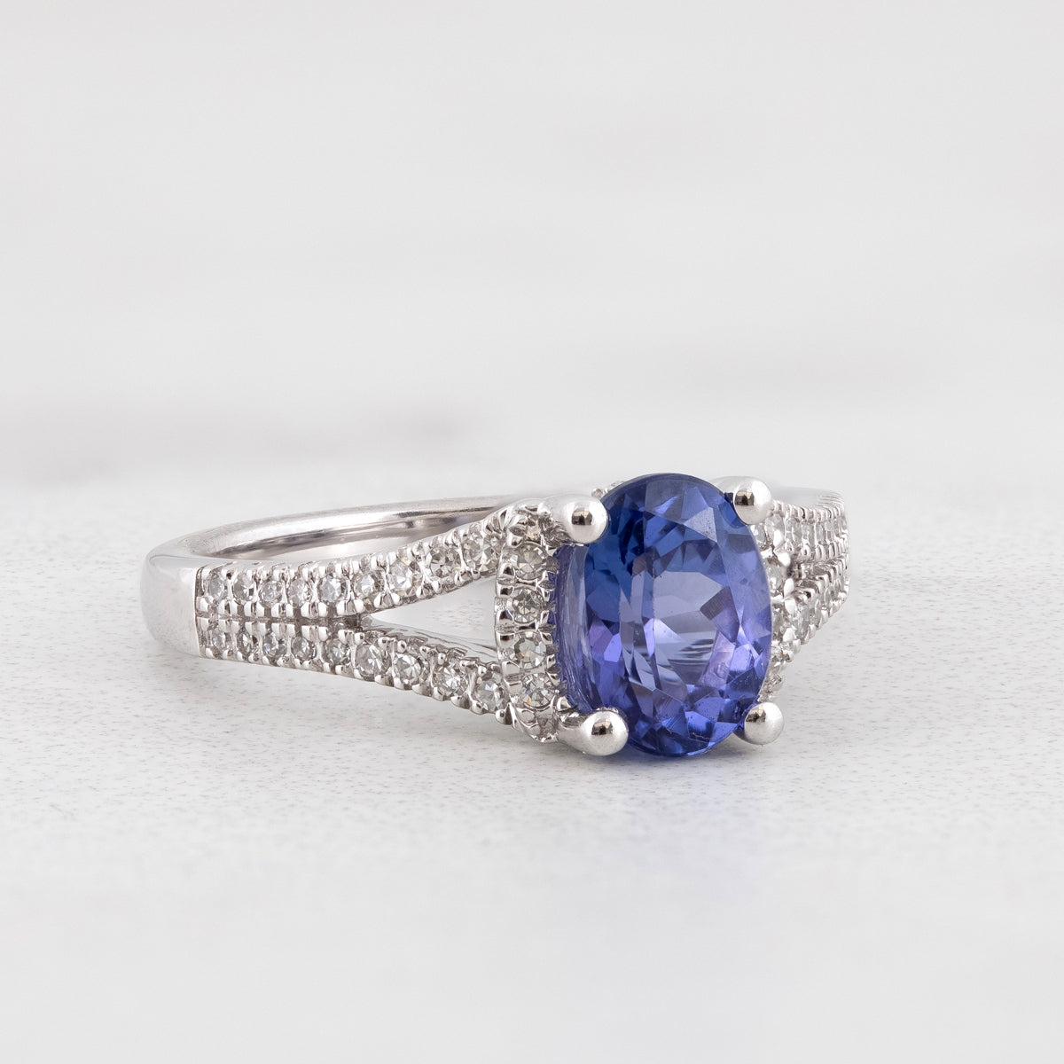 Oval Tanzanite & 1/4 ct. tw. Diamond Split Shank Ring in 10K White Gold close-up detail