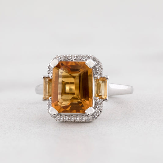 Emerald Cut Madeira Citrine & 1/10 ct. tw. Diamond Halo Ring with Baguette Citrine Accents in 10K White Gold close-up detail
