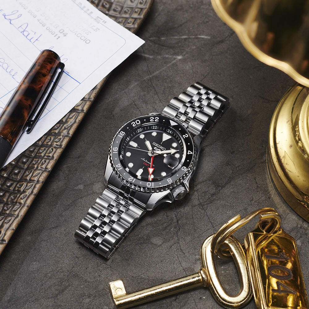 Seiko Men's 5 Sports SKX Series Automatic Stainless Steel Watch with Black Dial & Gray & Black Bezel front view