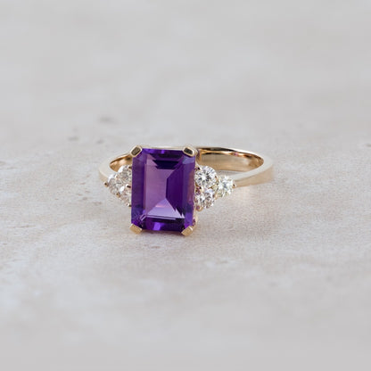 Emerald Cut Amethyst & 1/3 ct. tw. Diamond Ring in 14K Yellow Gold close-up detail