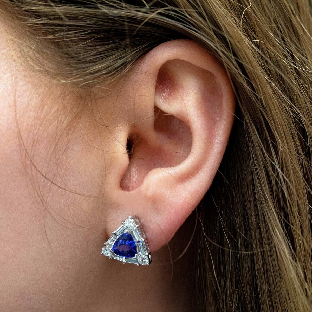 Trillion Tanzanite & 1-1/2 ct. tw. Round & Baguette Diamond Halo Earrings in 14K White Gold close-up detail