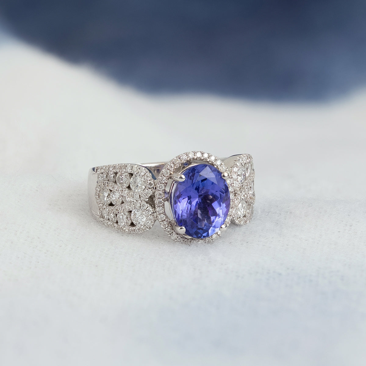 Oval Tanzanite & 1 ct. tw. Diamond Halo Ring in 14K White Gold close-up detail