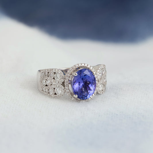 Oval Tanzanite & 1 ct. tw. Diamond Halo Ring in 14K White Gold close-up detail