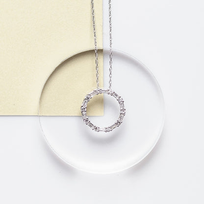 1/4 ct. tw. Round & Baguette Diamond Circle Pendant in 10K White Gold close-up detail