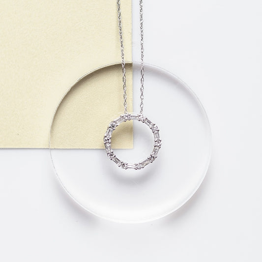 1/4 ct. tw. Round & Baguette Diamond Circle Pendant in 10K White Gold close-up detail