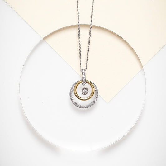 1/5 ct. tw. Diamond Double Circle Pendant with Miracle Plate in Sterling Silver & 10K Yellow Gold close-up detail