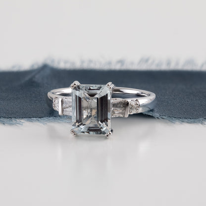 Emerald Cut Aquamarine & 1/4 ct. tw. Baguette & Round Diamond Ring in 14K White Gold close-up detail