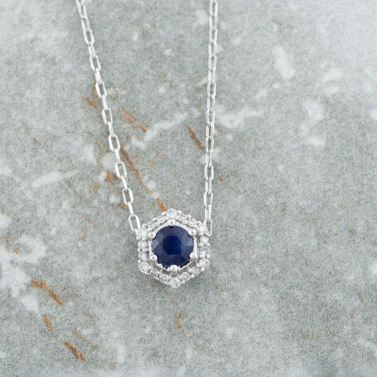 Round Sapphire & Diamond Accent Hexagon Halo Pendant in 10K White Gold front view