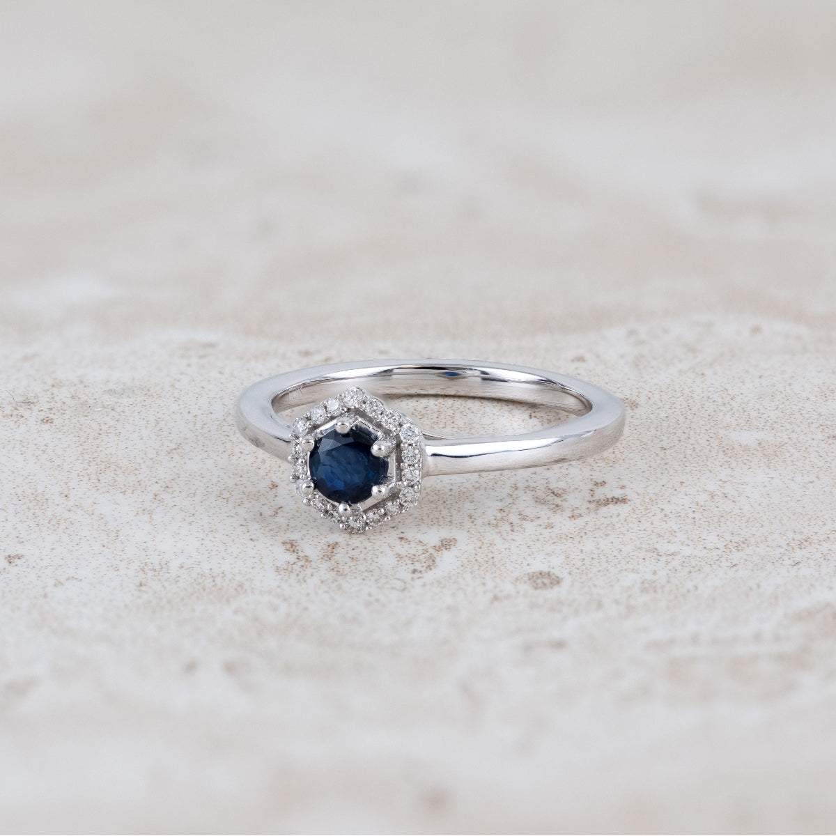 Round Sapphire & Diamond Accent Hexagon Halo Ring in 10K White Gold close-up detail