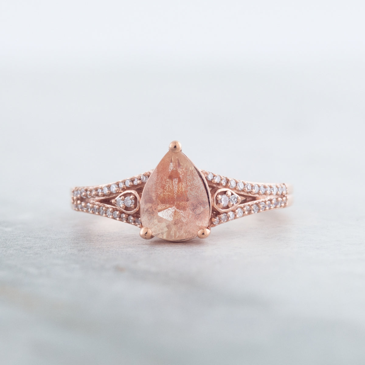 American Colors Pear Sunstone & 1/8 ct. tw. Diamond Split Shank Ring in 10K Pink Gold close-up detail