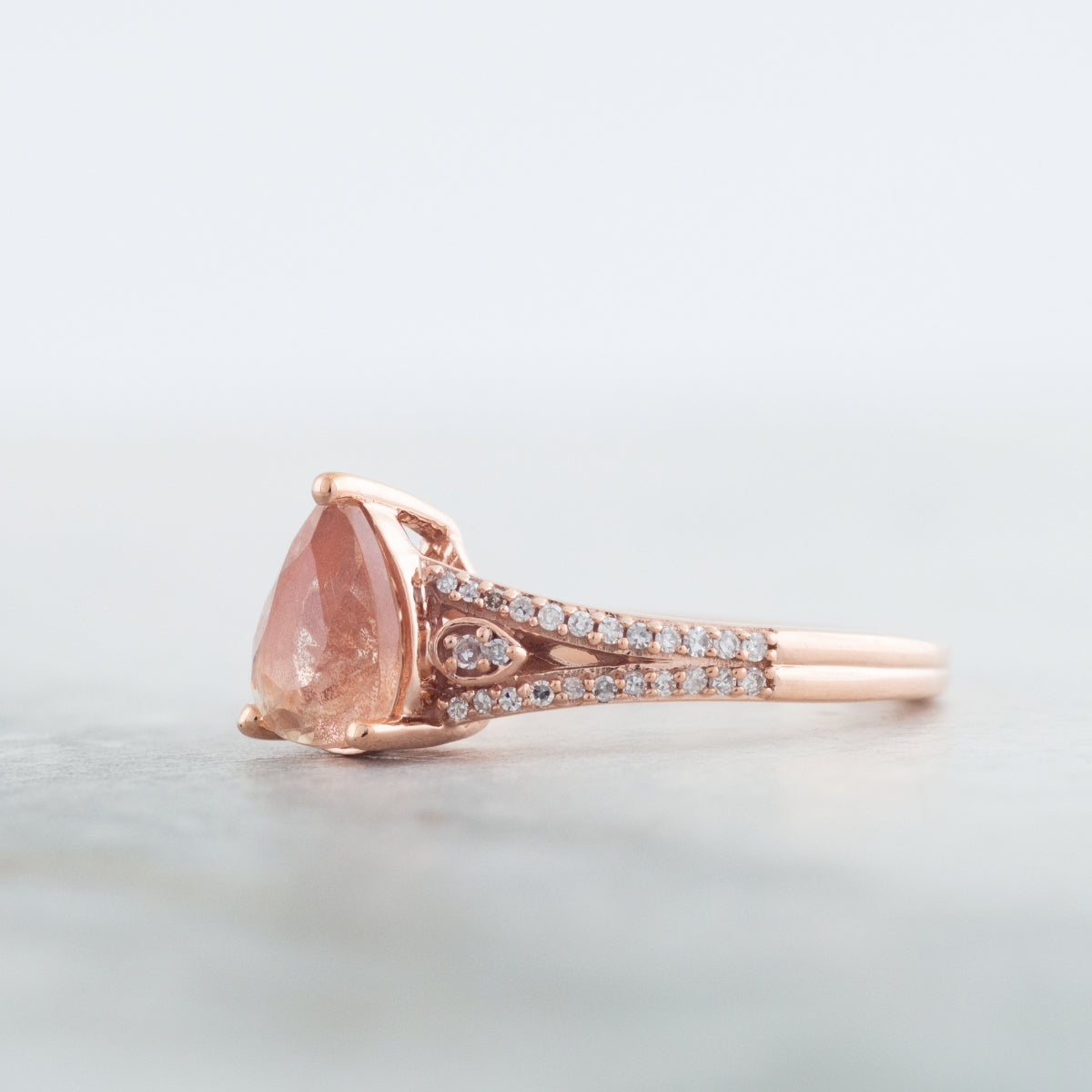 American Colors Pear Sunstone & 1/8 ct. tw. Diamond Split Shank Ring in 10K Pink Gold side profile