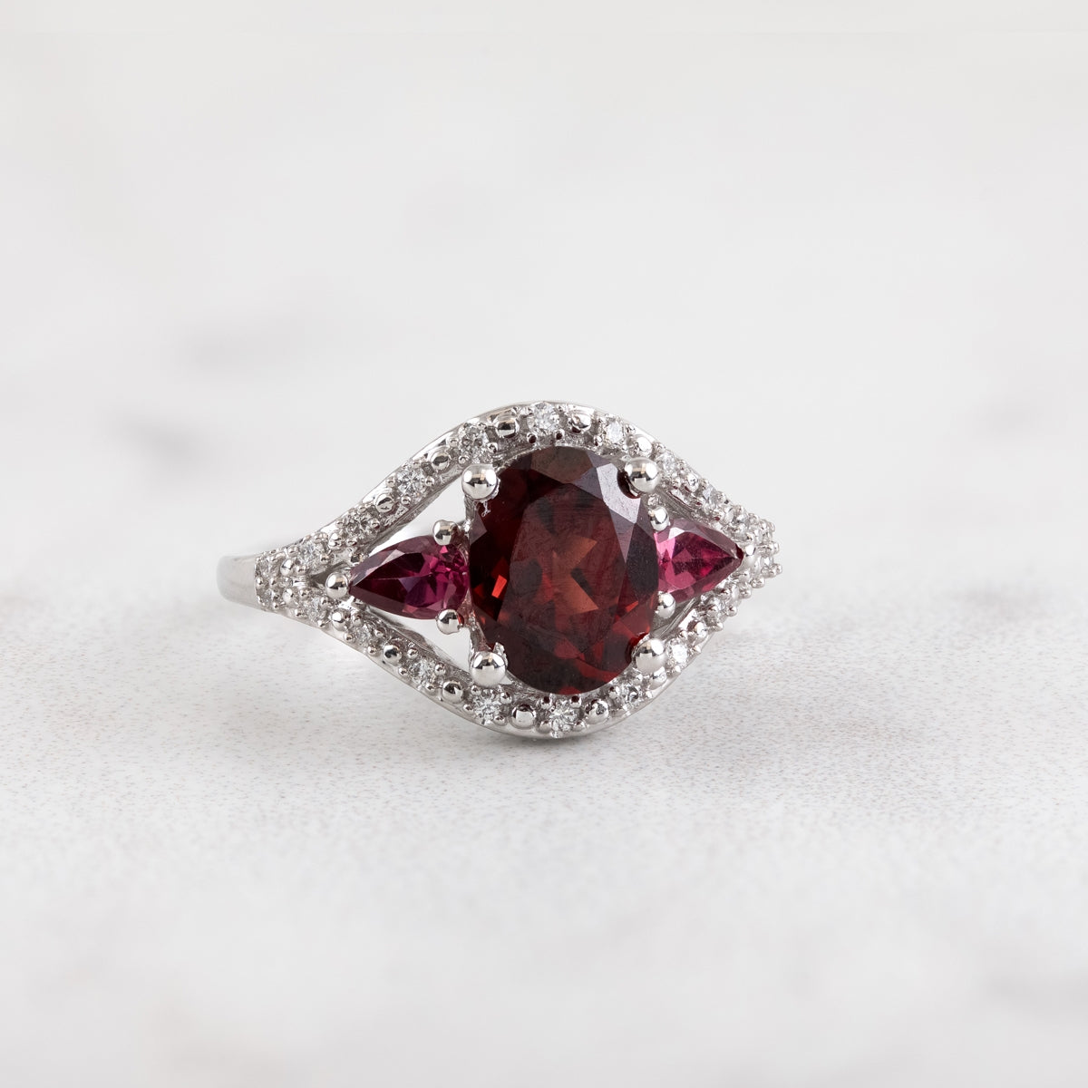 Oval Garnet, Pear Rhodolite Garnet & 1/7 ct. tw. Diamond Ring in 10K White Gold close-up detail