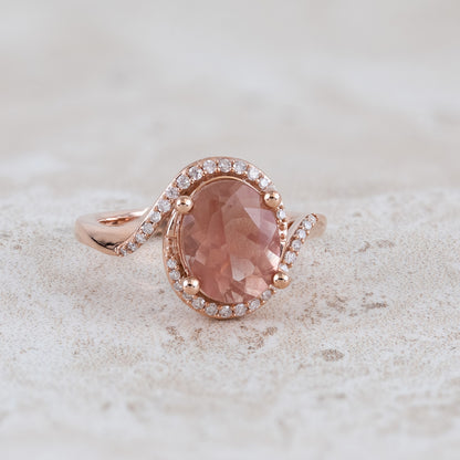 American Colors Oval Sunstone & 1/6 ct. tw. Diamond Halo Bypass Ring in 10K Pink Gold close-up detail