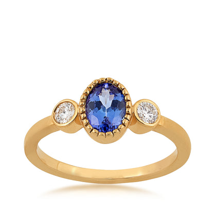 Oval Tanzanite & 1/6 ct. tw. Diamond Ring with Milgrain Halo in 14K Yellow Gold