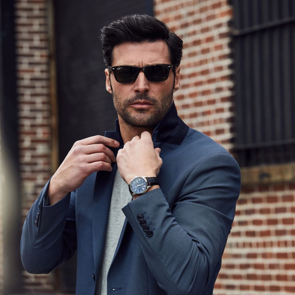 Bulova Wilton GMT Stainless Steel Watch with Blue Map Dial & Black Leather Strap close-up detail