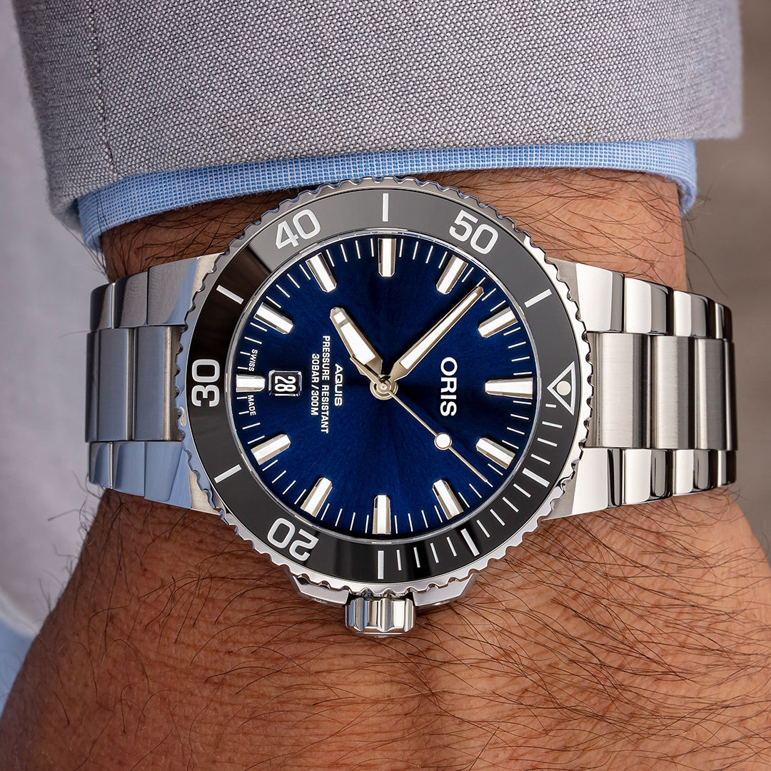 Oris Men's Aquis Date Automatic Stainless Steel Watch with Blue Dial close-up detail