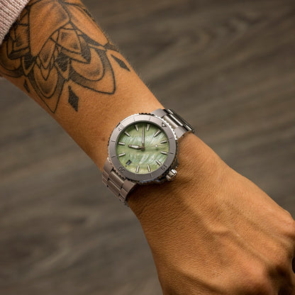 Oris Aquis Date Automatic Stainless Steel Watch with Green Mother of Pearl Dial close-up detail