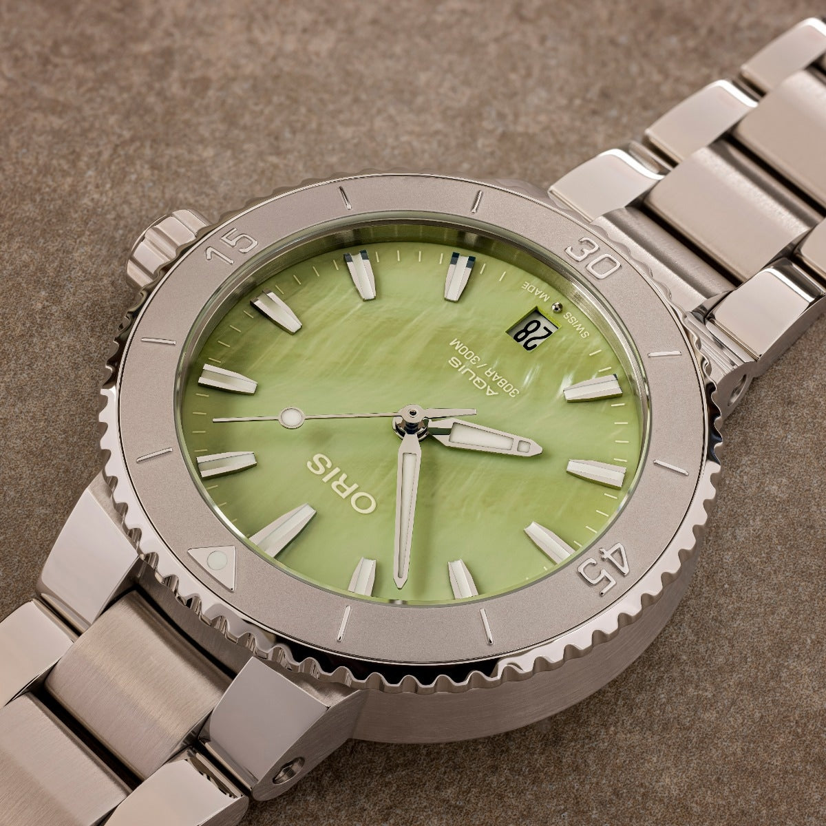 Oris Aquis Date Automatic Stainless Steel Watch with Green Mother of Pearl Dial front view