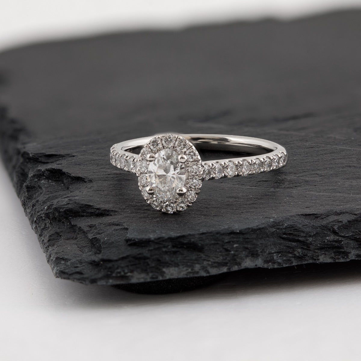 Natural 1-1/10 ct. tw. Oval Diamond Halo Engagement Ring in Platinum close-up detail