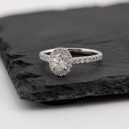 Natural 1-1/10 ct. tw. Oval Diamond Halo Engagement Ring in Platinum close-up detail
