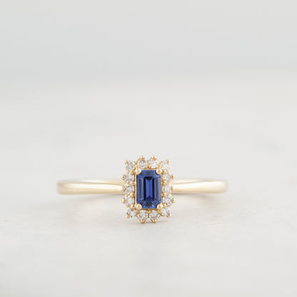 Emerald Cut Yogo Sapphire & 1/10 ct. tw. Diamond Halo Ring in 10K Yellow Gold close-up detail