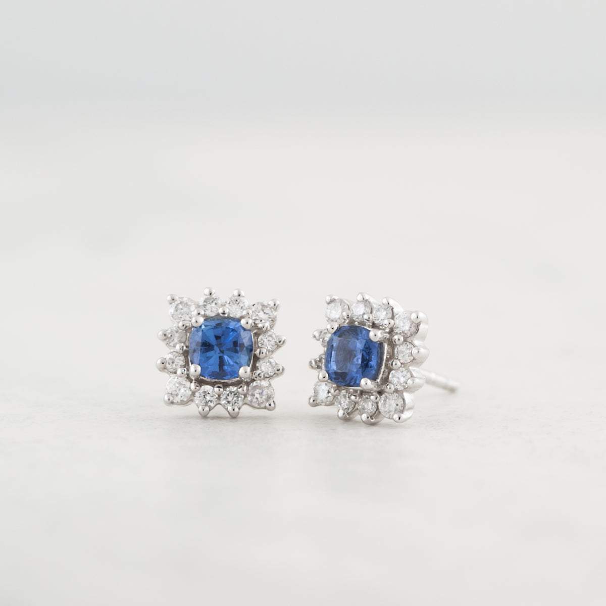 Cushion Yogo Sapphire & 1/5 ct. tw. Diamond Halo Earrings in 10K White Gold front view