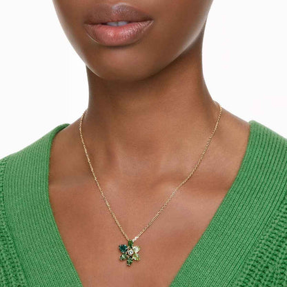Swarovski Gema Pear & Marquise Green Crystal Flower Pendant in Yellow Gold-Tone Plating close-up detail