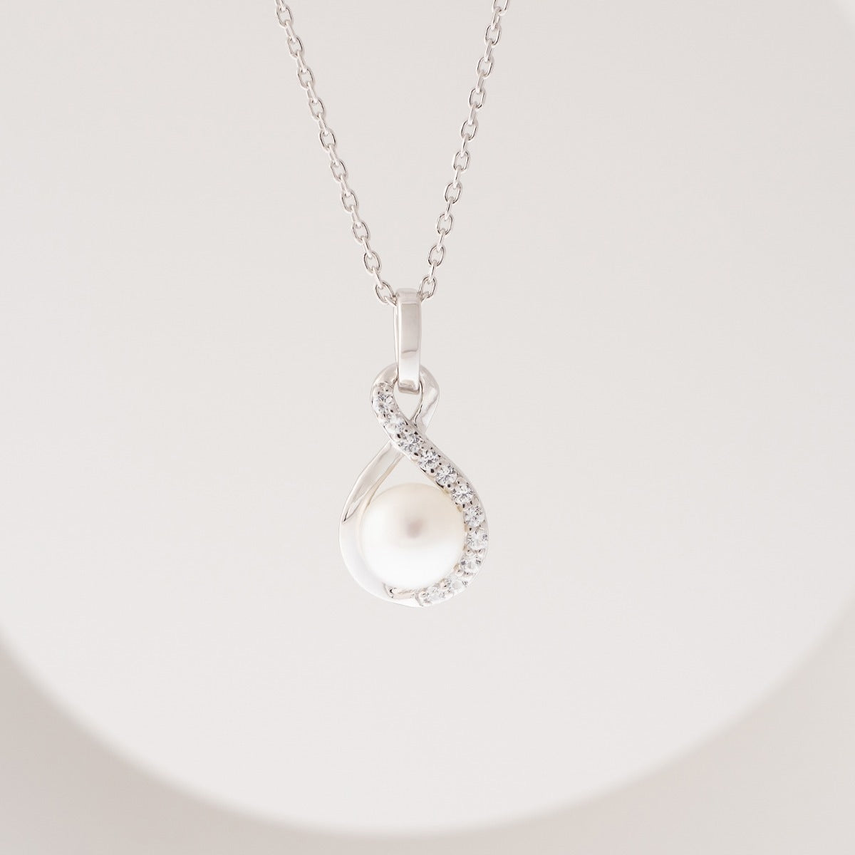 Freshwater Pearl & Created White Sapphire Twist Pendant in Sterling Silver front view