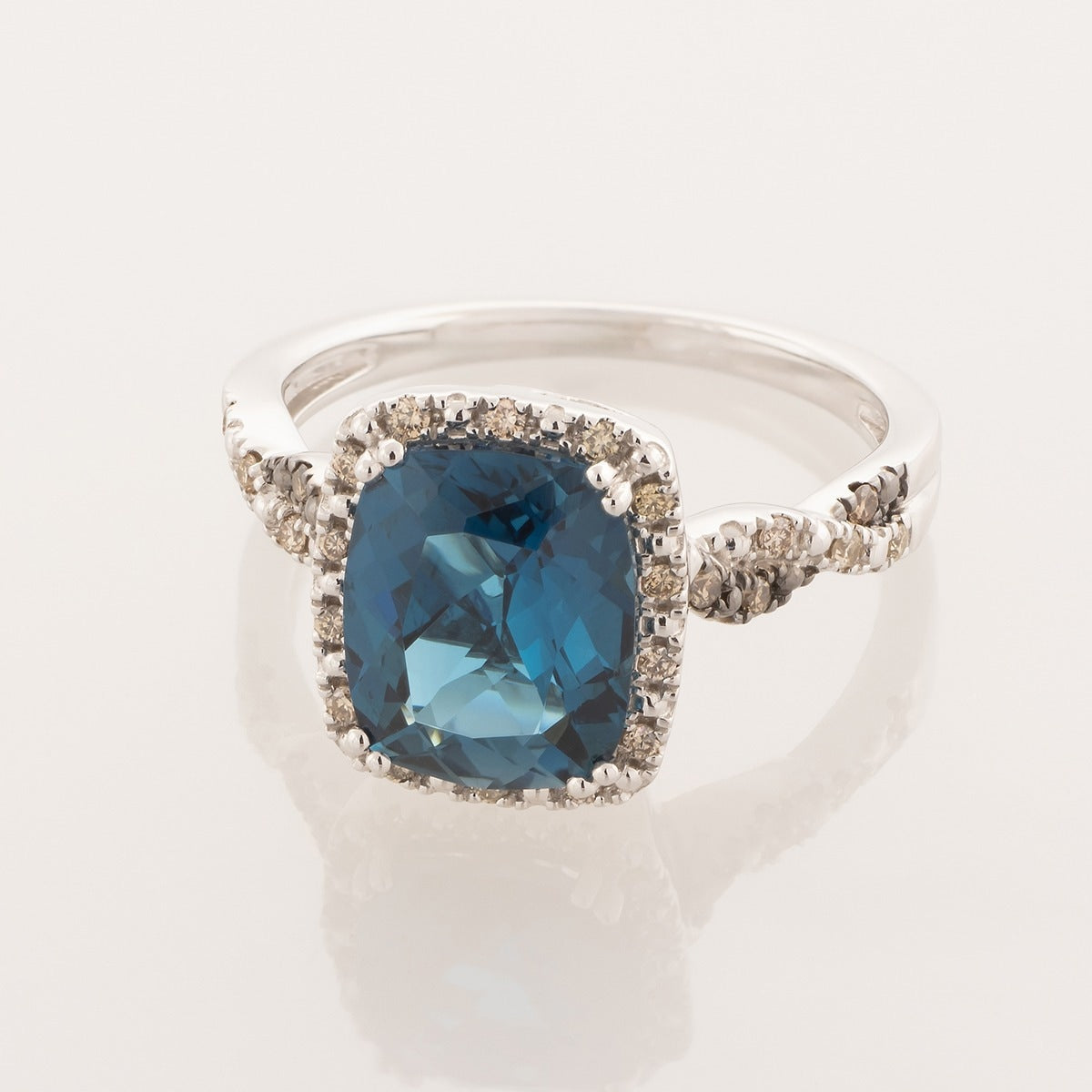 Le Vian Cushion Deep Sea Blue Topaz & 1/7 ct. tw. Nude & Chocolate Diamond Halo Twist Ring in 14K Vanilla Gold front view