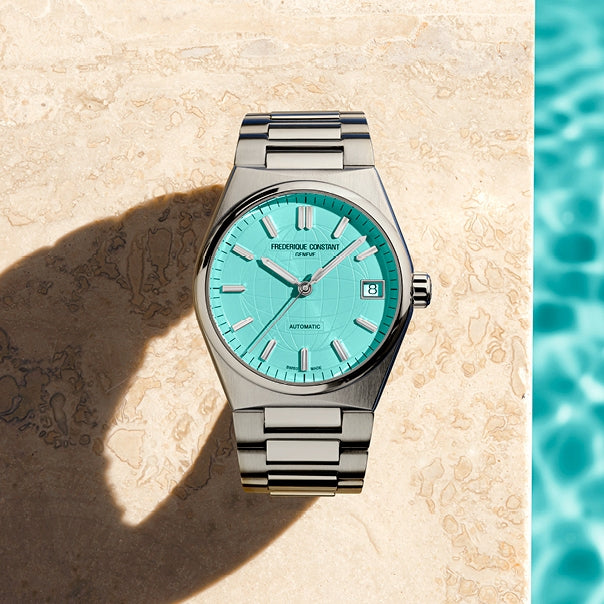 Frederique Constant Ladies' Highlife Automatic Stainless Steel Watch with Blue Globe Pattern Dial close-up detail