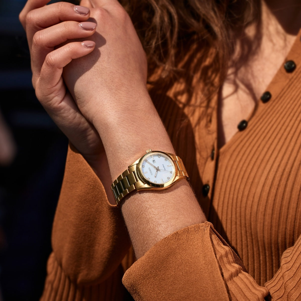 Citizen Ladies' Sport Luxury Eco-Drive Gold-Tone Stainless Steel Watch with Diamond Accent Mother of Pearl Dial side profile