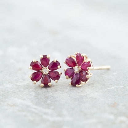Pear Ruby & Diamond Accent Flower Earrings in 10K Yellow Gold front view