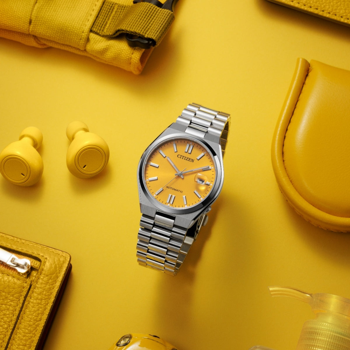 Citizen Men's TSUYOSA Automatic Stainless Steel Watch with Yellow Dial side profile
