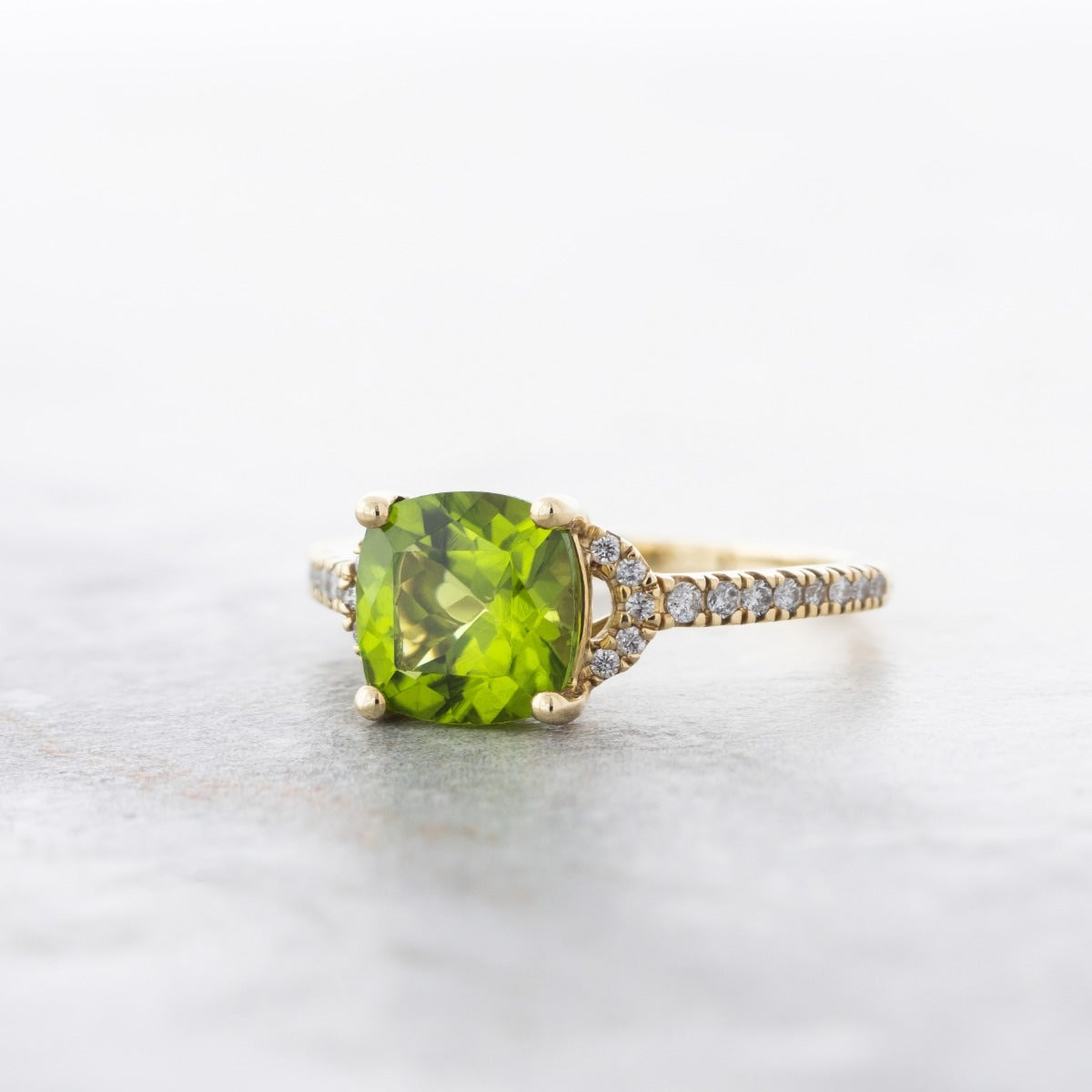 American Colors Cushion Peridot & 1/6 ct. tw. Diamond Ring in 10K Yellow Gold close-up detail