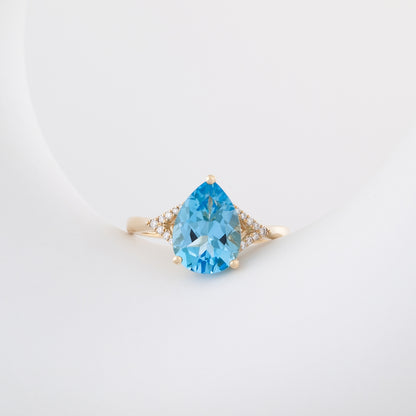 Pear Swiss Blue Topaz & Diamond Accent Ring in 10K Yellow Gold close-up detail