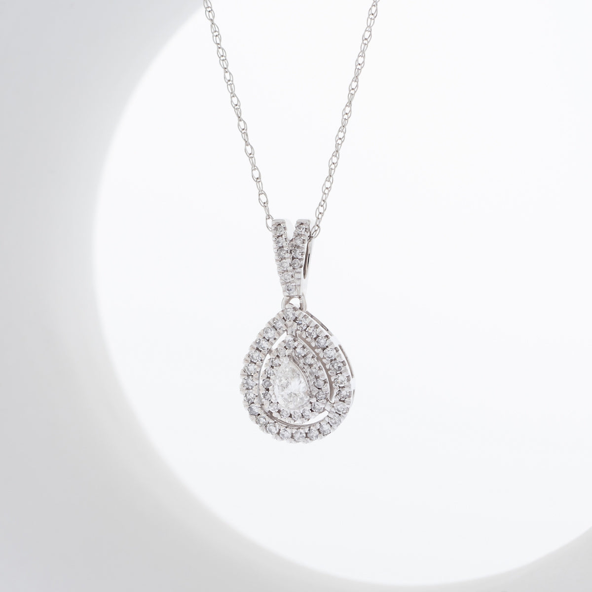1/3 ct. tw. Pear Diamond Double Halo Pendant in 10K White Gold front view