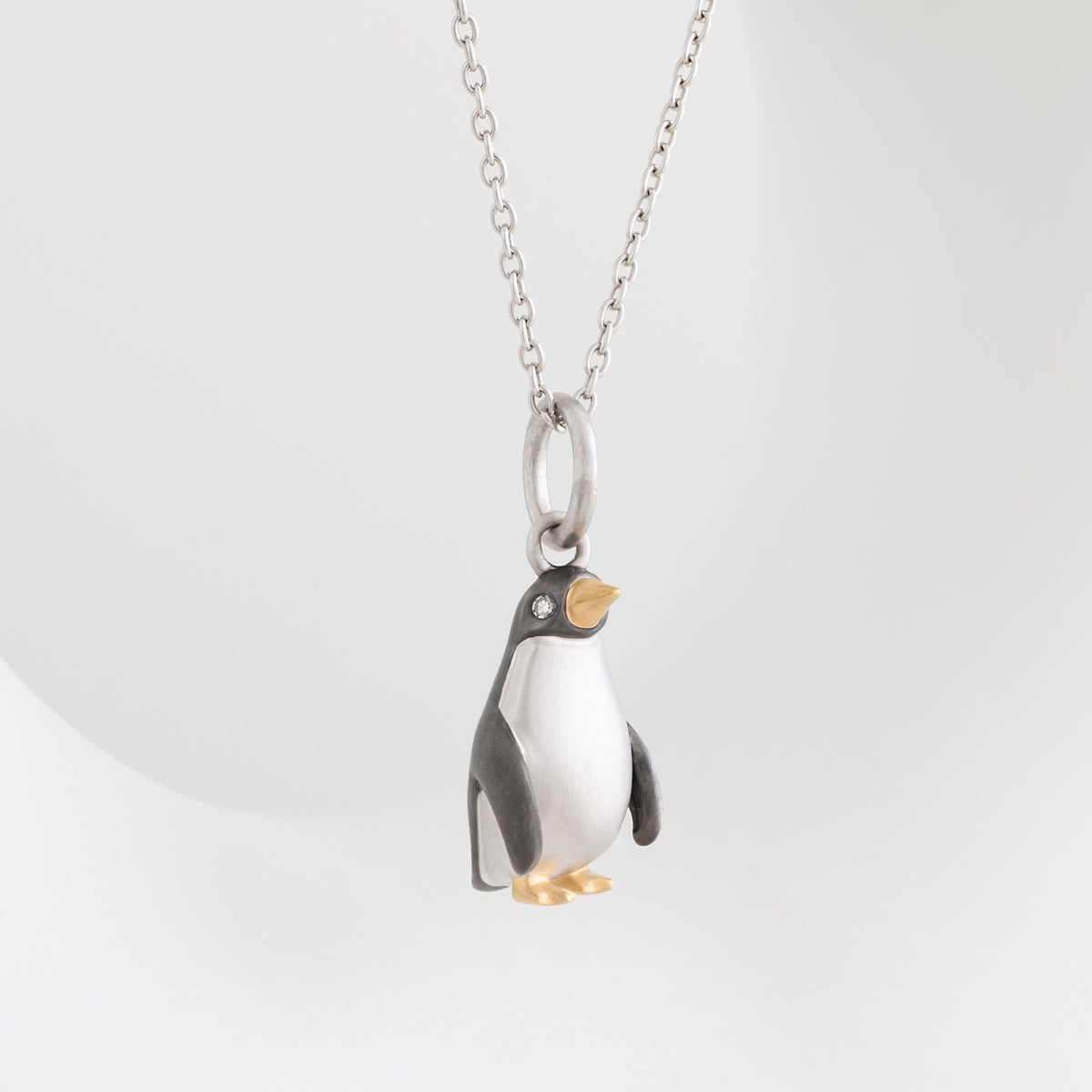 Diamond Accent Penguin Pendant with Black Rhodium in 14K Yellow Gold over Sterling Silver close-up detail