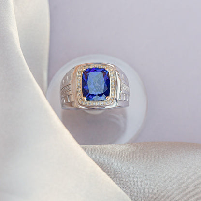 Men's Created Cushion Sapphire & 1/7 ct. tw. Diamond Halo Ring in Sterling Silver & 10K Yellow Gold close-up detail