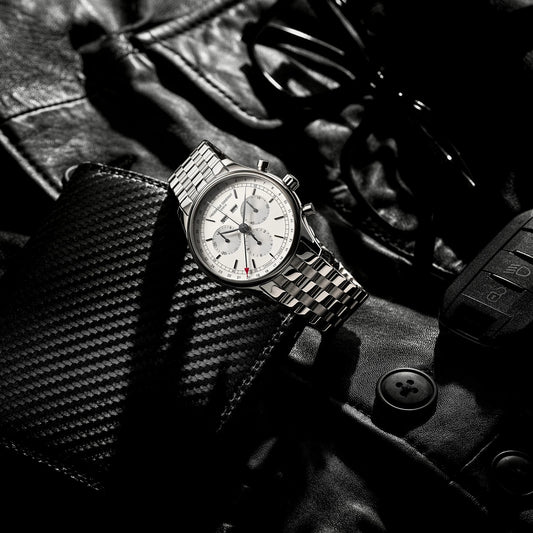 Frederique Constant Men's Triple Calendar Quartz Stainless Steel Watch with Silver Dial close-up detail