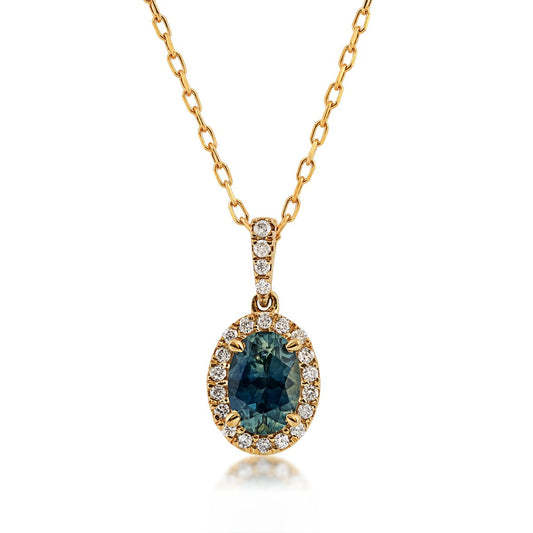 American Colors Oval Montana Sapphire & 1/10 ct. tw. Diamond Halo Pendant in 10K Yellow Gold