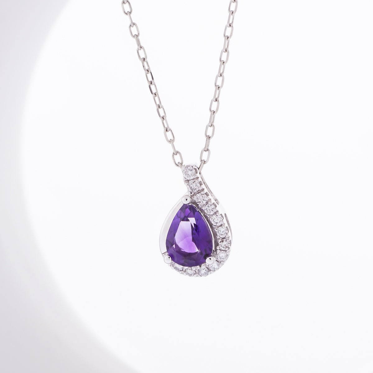 Pear Amethyst & 1/10 ct. tw. Diamond Half Halo Pendant in 10K White Gold front view