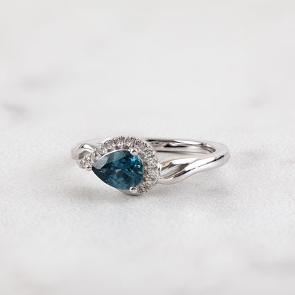 American Colors Pear Montana Sapphire & 1/10 ct. tw. Diamond Half Halo Twist Ring in 10K White Gold close-up detail