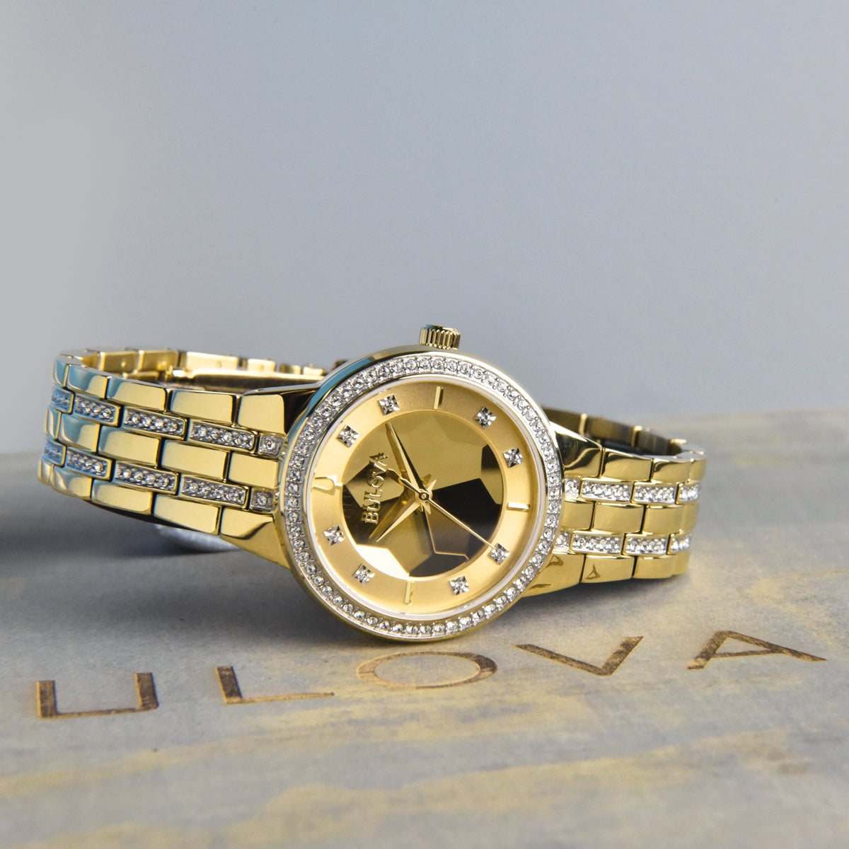 Bulova Ladies' Phantom Quartz Gold-Tone Stainless Steel Watch with Crystal Accent Champagne Dial side profile