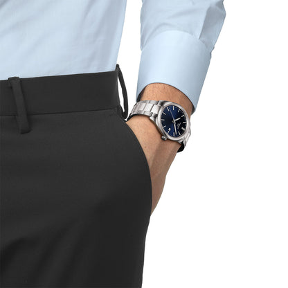 stainless steel men's Tissot quartz watch with blue dial