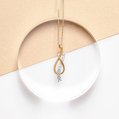 Journey Collection 1/2 ct. tw. Diamond Knot Pendant in 10K Yellow Gold front view